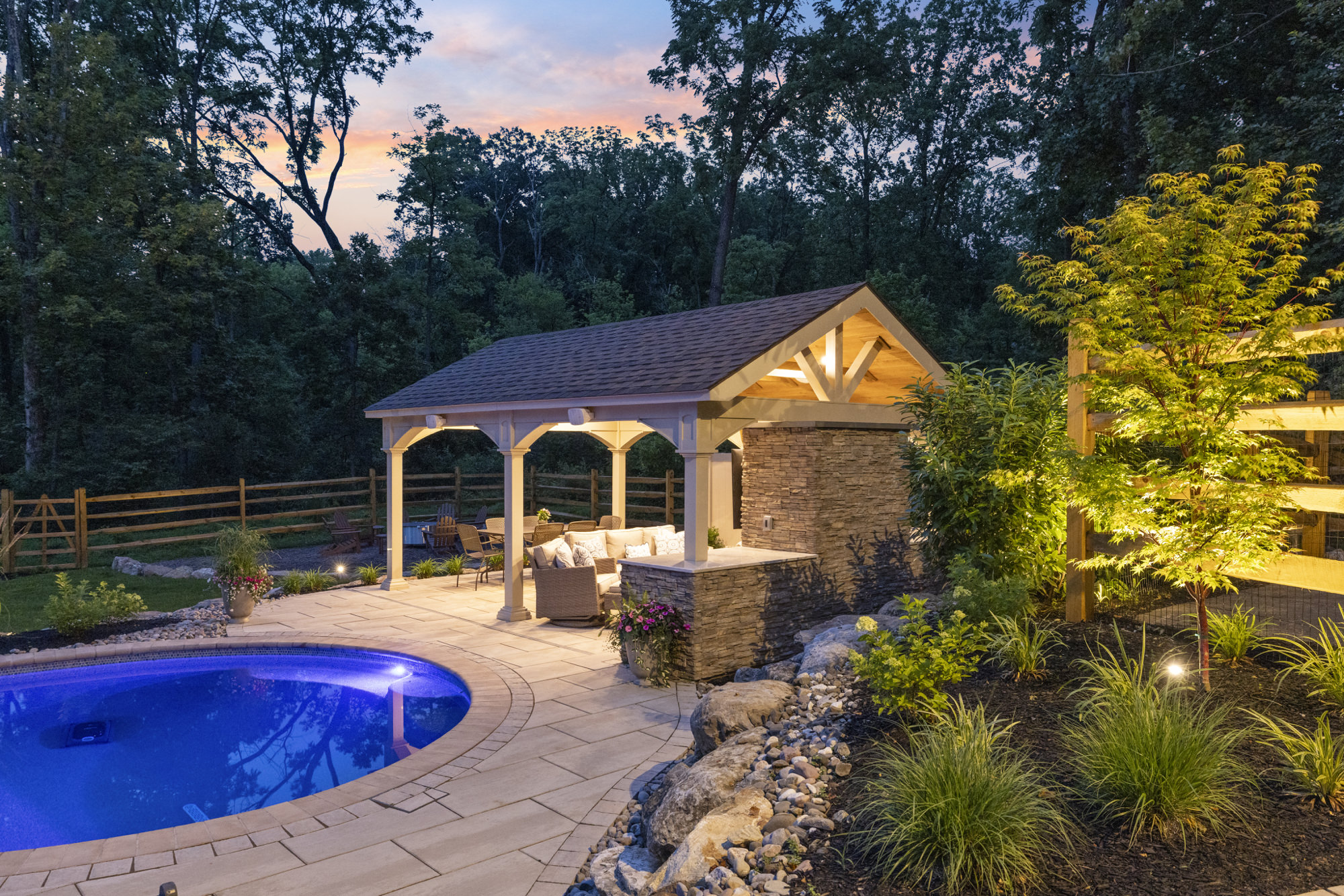 Outdoor kitchen with stone counter and hardscape in Center Valley, PA