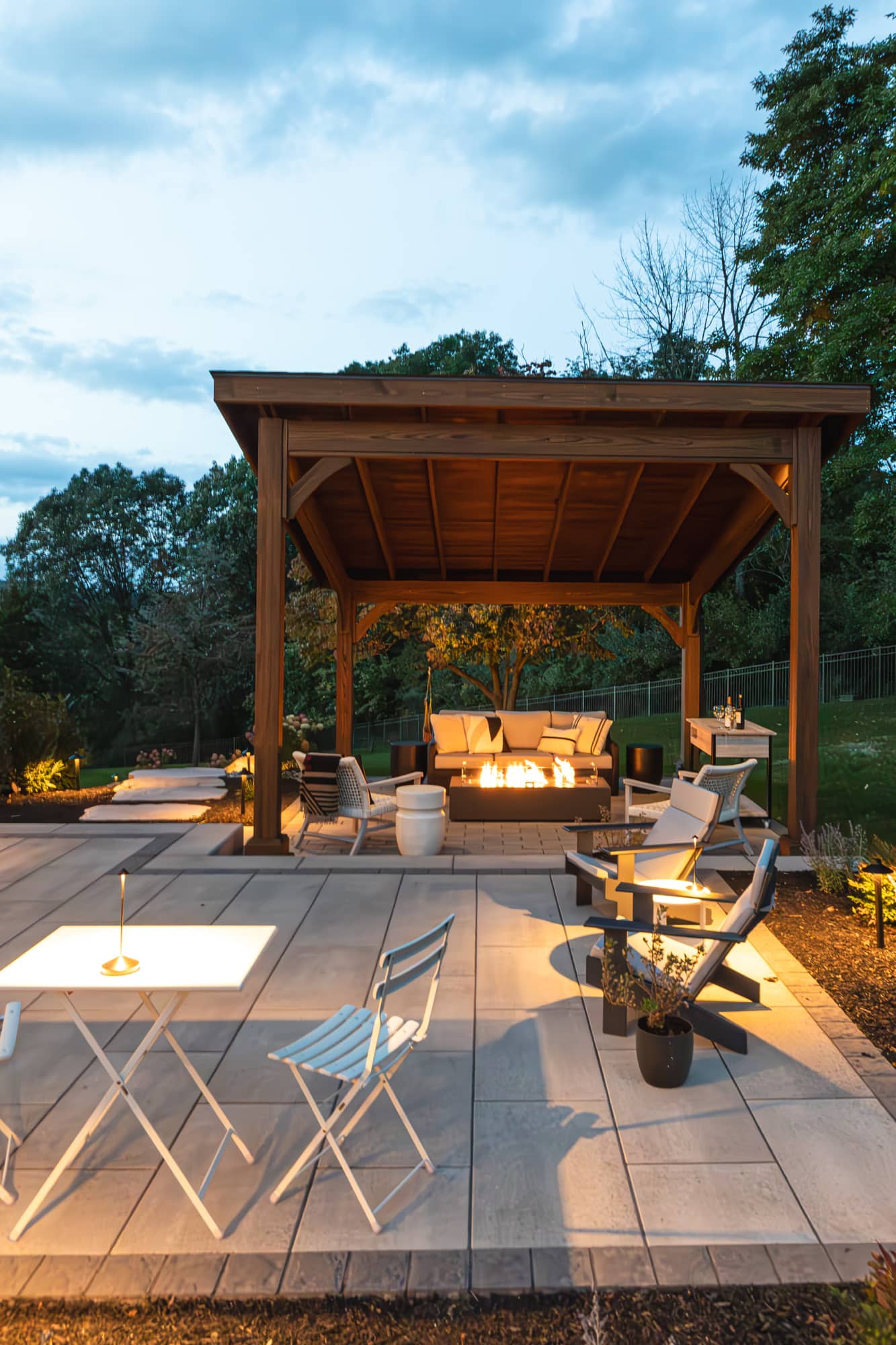 Natural stone patio with outdoor kitchen and pavilion